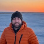 Photo of person near ocean